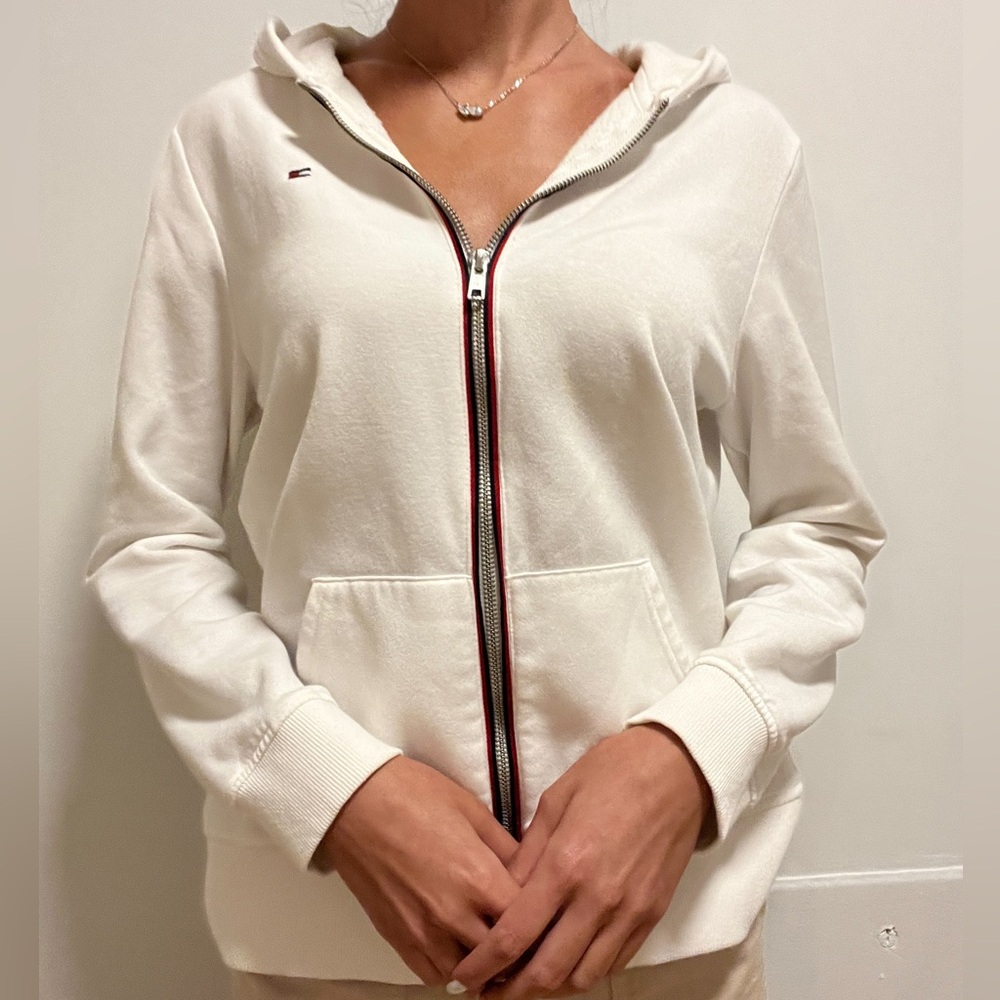 Tommy Hilfiger zip up jacket with a hood. Ivory color size XS